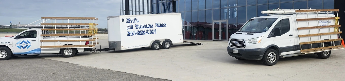Evas All Seasons Glass Truck and van at work site